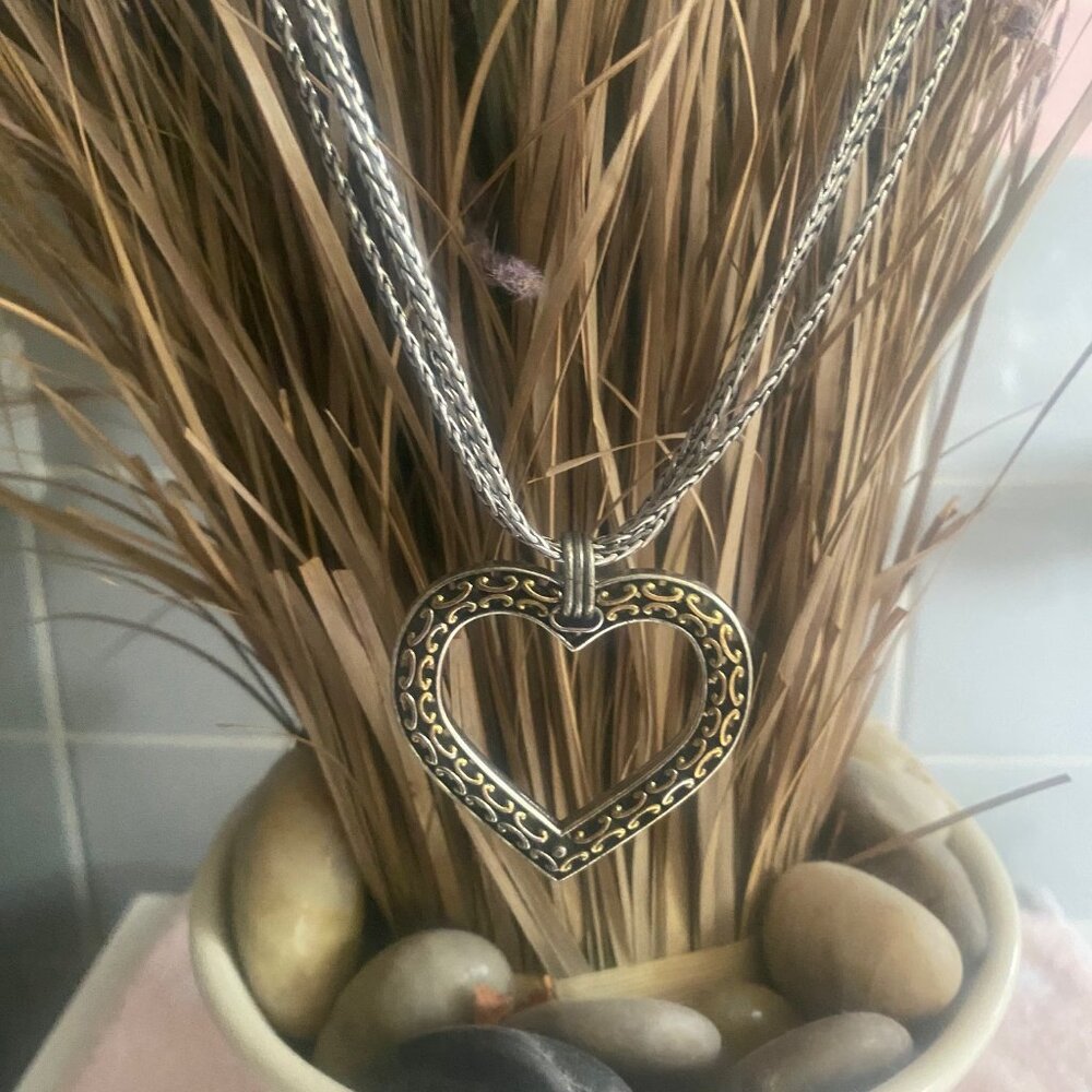 Brighton open heart necklace, gold tone one side, silver tone other side.